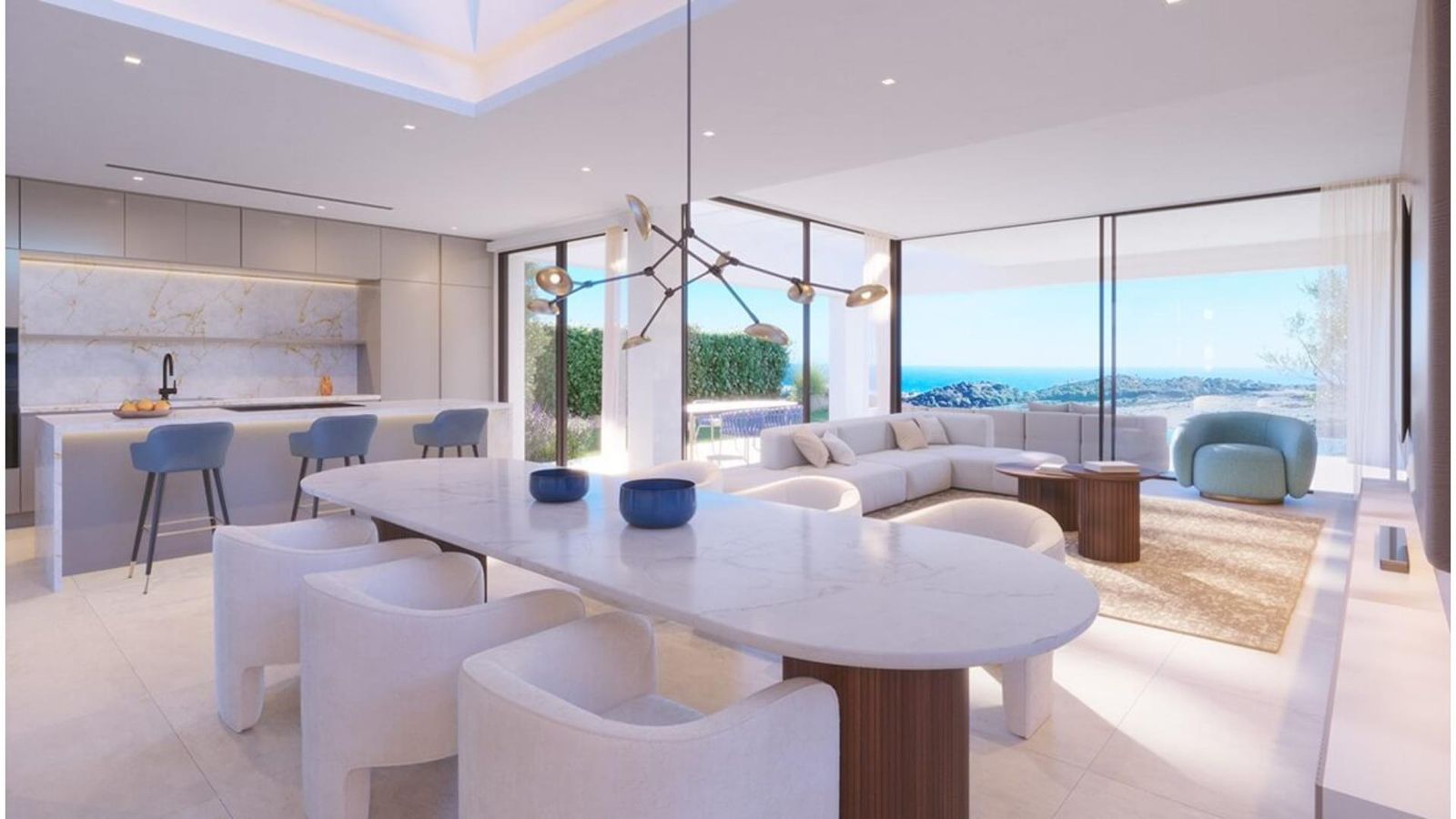 Modern villa med öppen planlösning och havsutsikt.